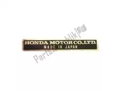 Here you can order the plate, name from Honda, with part number 87125041680: