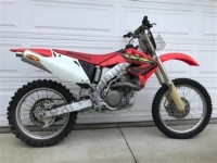 Todas as peças originais e de reposição para seu Honda CRF 450R 2002.