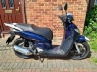 Alle originele en vervangende onderdelen voor uw Honda SH 125 2006.