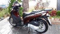 Alle originele en vervangende onderdelen voor uw Honda SH 125 2011.