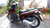 Todas as peças originais e de reposição para seu Honda SH 125R 2011.