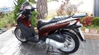 Todas as peças originais e de reposição para seu Honda SH 125S 2011.