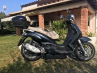 Wszystkie oryginalne i zamienne części do Twojego Piaggio Beverly 250 Tourer E3 2007.