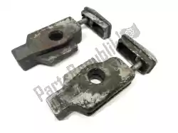 Here you can order the drive chain tensioner from Aprilia, with part number AP8121257: