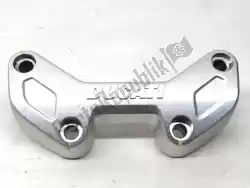 Here you can order the handlebar clamp from Ducati, with part number 36011781AA: