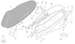 Saddle and helmet compartment