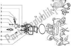 Cylinder head and induction pipe