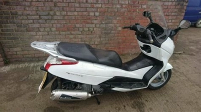 De onderdelen catalogus van de Honda Fes125 2011, 125cc